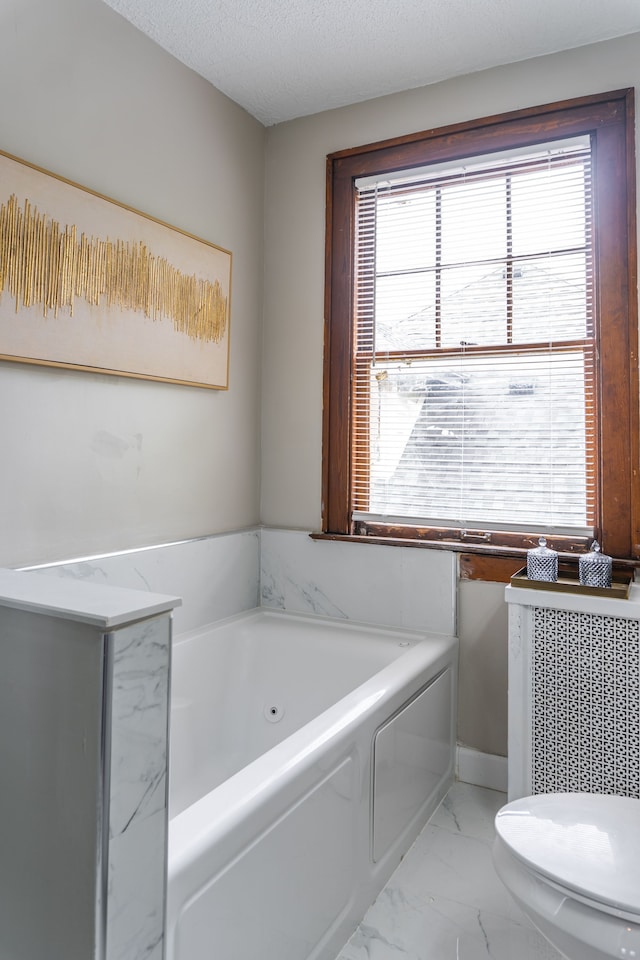 2285 Chicago Blvd, Detroit, MI 48206 - full bath featuring a whirlpool tub, marble look tile flooring, and toilet