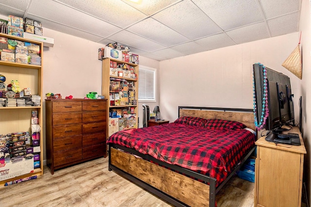 238-240 W Division St, Sparta, MI 49345 - bedroom with wood finished floors and a drop ceiling