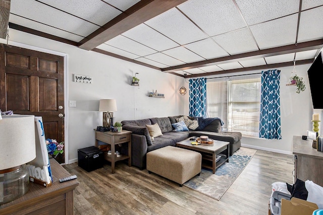 238-240 W Division St, Sparta, MI 49345 - living area featuring wood finished floors and baseboards