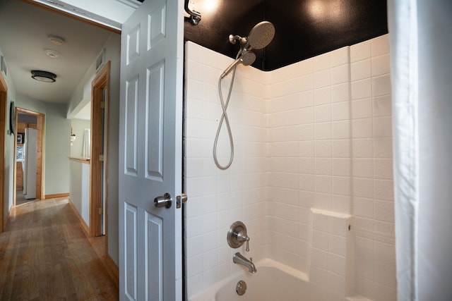 30664 Burlington St, Westland, MI 48186 - full bathroom with shower / bath combination with curtain and wood finished floors