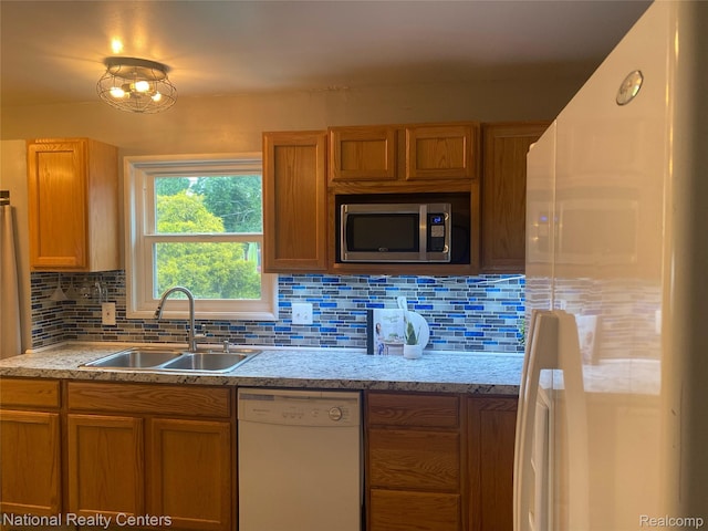 30664 Burlington St, Westland, MI 48186 - kitchen with white appliances, a sink, backsplash, and light countertops