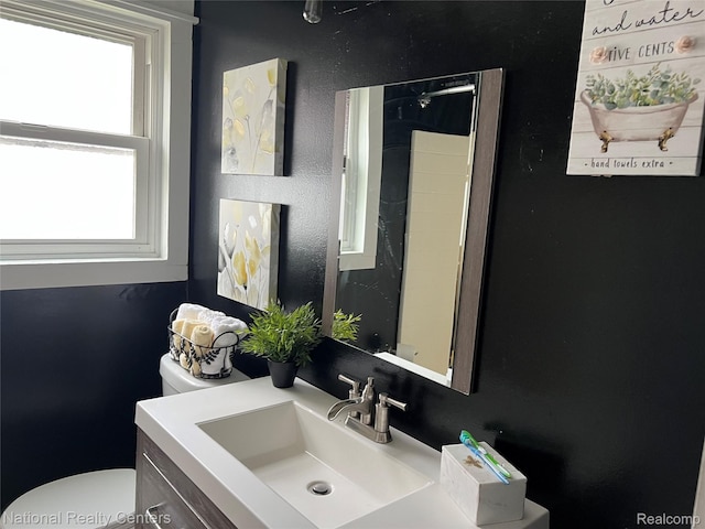 30664 Burlington St, Westland, MI 48186 - bathroom featuring toilet, vanity, and a shower