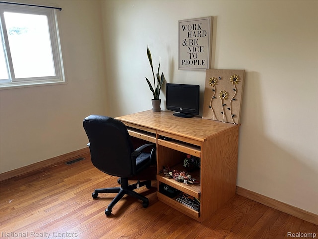 30664 Burlington St, Westland, MI 48186 - home office featuring wood finished floors and baseboards