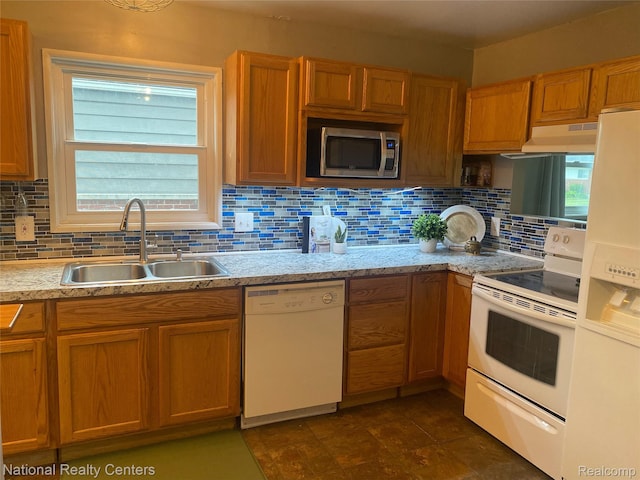 30664 Burlington St, Westland, MI 48186 - kitchen with white appliances, a sink, under cabinet range hood, backsplash, and light countertops