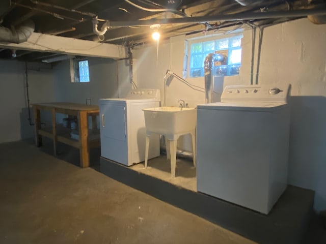 below grade area with washer and clothes dryer