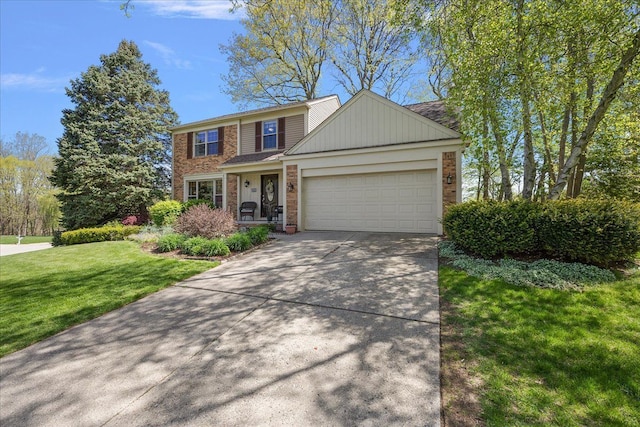 traditional-style home featuring brick siding, a front yard, concrete driveway, and a garage