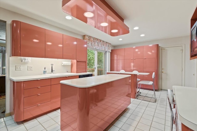 5080 Kitson Ln, West Bloomfield, MI 48324 - kitchen with light tile patterned flooring, recessed lighting, a sink, light countertops, and modern cabinets
