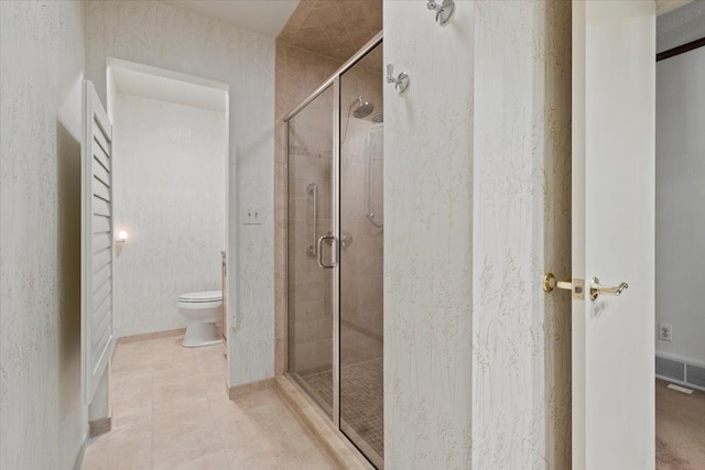 5080 Kitson Ln, West Bloomfield, MI 48324 - full bath with a stall shower, toilet, and tile patterned floors
