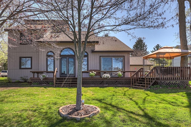 3541 Highland Blvd, Highland, MI 48356 - back of house featuring a gazebo, a wooden deck, and a lawn
