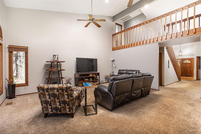 3541 Highland Blvd, Highland, MI 48356 - living area with carpet, high vaulted ceiling, and ceiling fan