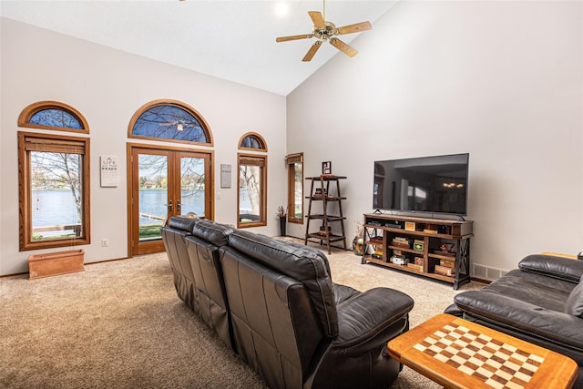 3541 Highland Blvd, Highland, MI 48356 - carpeted living area featuring high vaulted ceiling, a ceiling fan, french doors, and baseboards