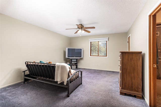 3541 Highland Blvd, Highland, MI 48356 - carpeted bedroom with a textured ceiling, baseboards, and a ceiling fan
