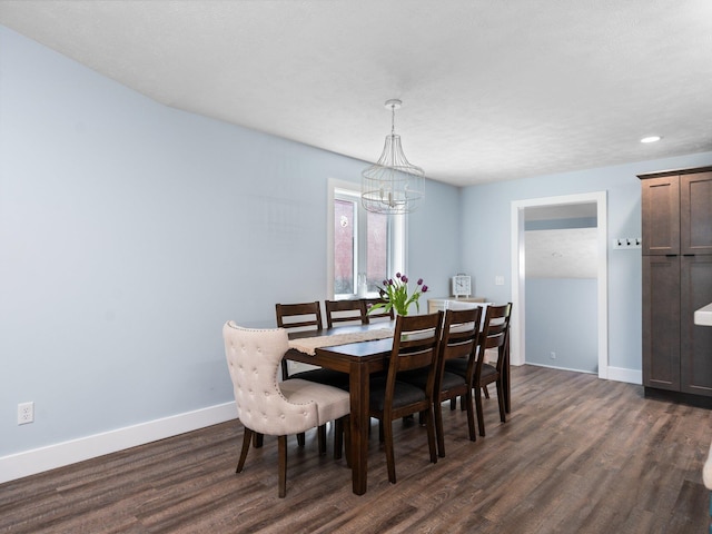 119 Maple St, Fife Lake, MI 49633 - dining area with a chandelier, dark wood-type flooring, baseboards, and recessed lighting