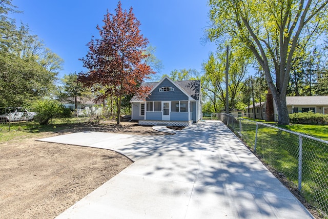 8345 Pontiac Lake Rd, White Lake, MI 48386 - view of front facade with fence