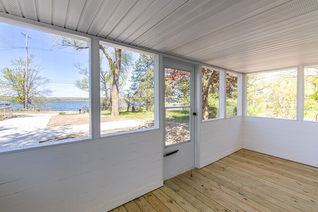 8345 Pontiac Lake Rd, White Lake, MI 48386 - unfurnished sunroom with a water view