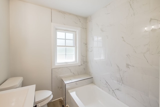 8345 Pontiac Lake Rd, White Lake, MI 48386 - full bath featuring a tub to relax in, toilet, and vanity