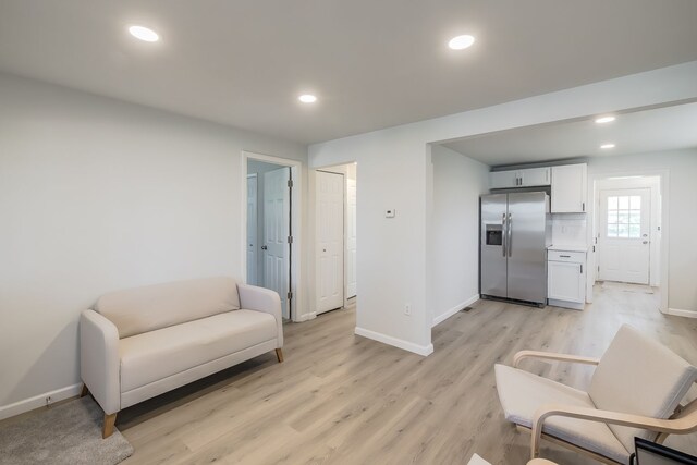 8345 Pontiac Lake Rd, White Lake, MI 48386 - sitting room featuring light wood-style floors, baseboards, and recessed lighting