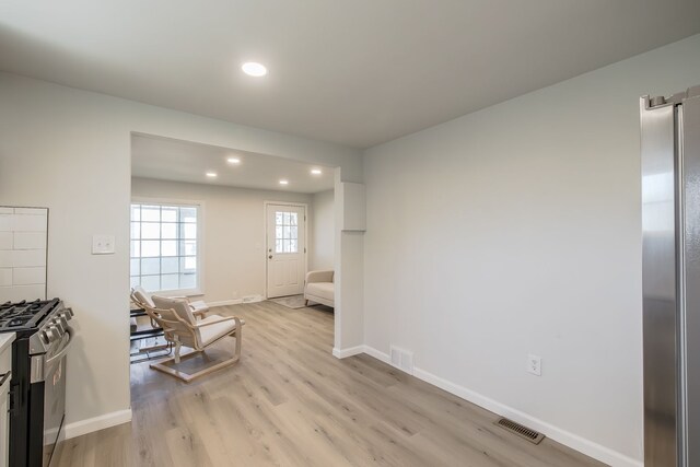 8345 Pontiac Lake Rd, White Lake, MI 48386 - sitting room with recessed lighting, light wood-type flooring, and baseboards