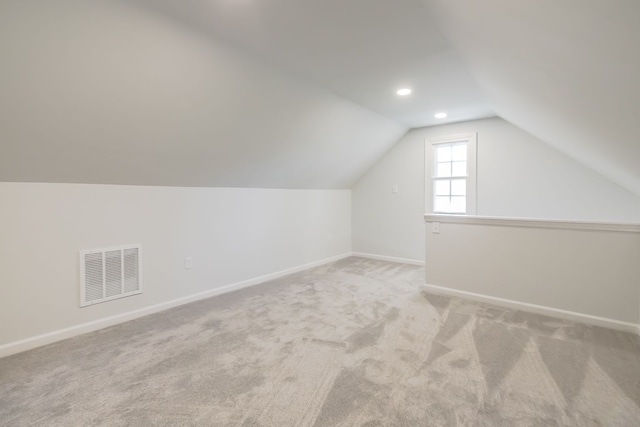 8345 Pontiac Lake Rd, White Lake, MI 48386 - bonus room with lofted ceiling, carpet floors, baseboards, and recessed lighting