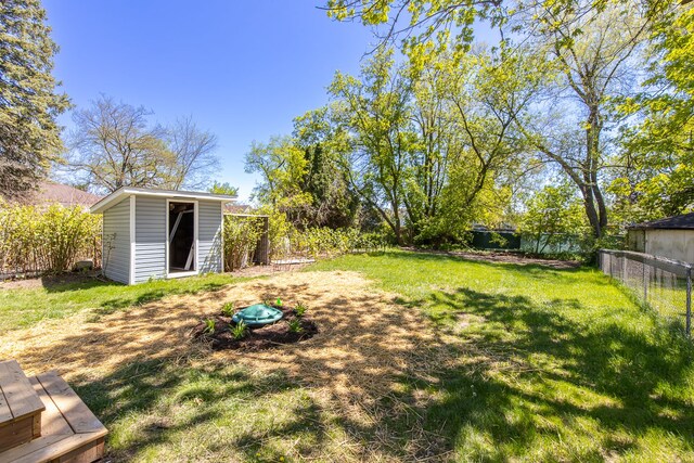 8345 Pontiac Lake Rd, White Lake, MI 48386 - view of yard featuring a shed and an outdoor structure