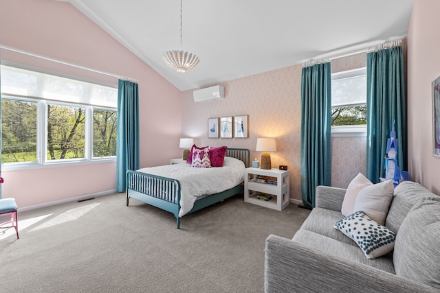 bedroom featuring carpet floors, a wall mounted air conditioner, baseboards, vaulted ceiling, and wallpapered walls