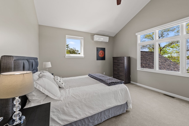 carpeted bedroom featuring a wall unit AC, lofted ceiling, baseboards, and ceiling fan