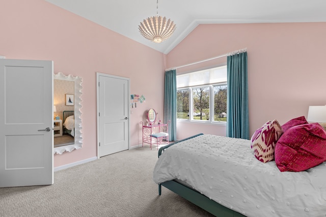 carpeted bedroom with baseboards and high vaulted ceiling