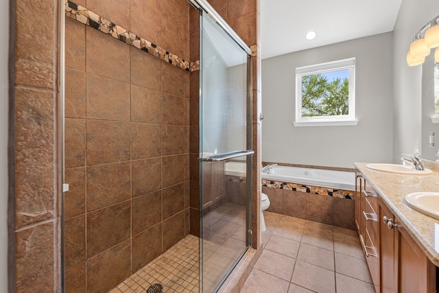 full bath featuring a garden tub, a stall shower, double vanity, tile patterned floors, and recessed lighting