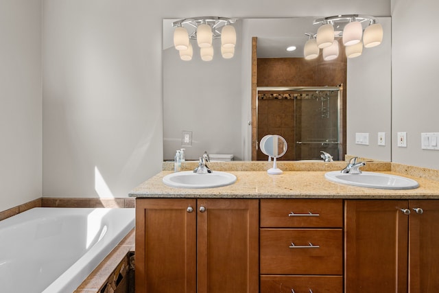 full bathroom featuring a shower stall, double vanity, and a bath