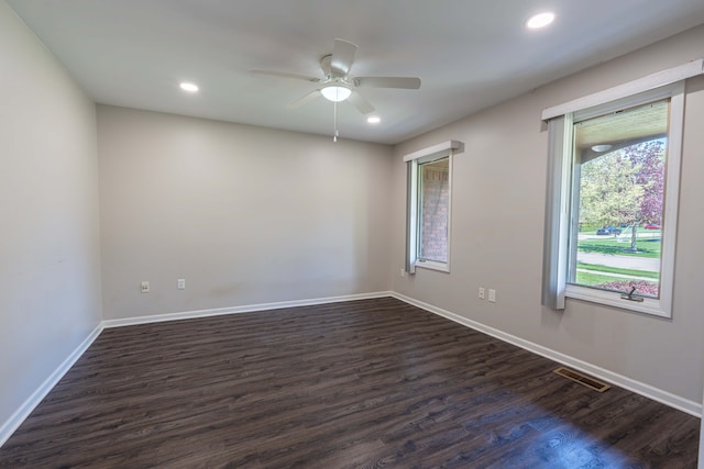 52201 Boland Rd, Chesterfield, MI 48047 - unfurnished room with dark wood finished floors, a ceiling fan, baseboards, and recessed lighting
