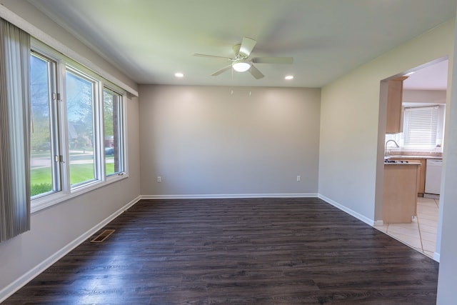 52201 Boland Rd, Chesterfield, MI 48047 - spare room featuring ceiling fan, wood finished floors, recessed lighting, baseboards, and a sink