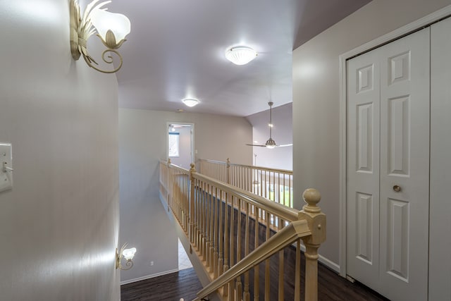 52201 Boland Rd, Chesterfield, MI 48047 - hallway with an upstairs landing, baseboards, wood finished floors, and vaulted ceiling