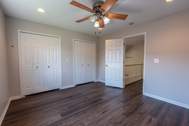 52201 Boland Rd, Chesterfield, MI 48047 - unfurnished bedroom with multiple closets, baseboards, dark wood-type flooring, recessed lighting, and ceiling fan