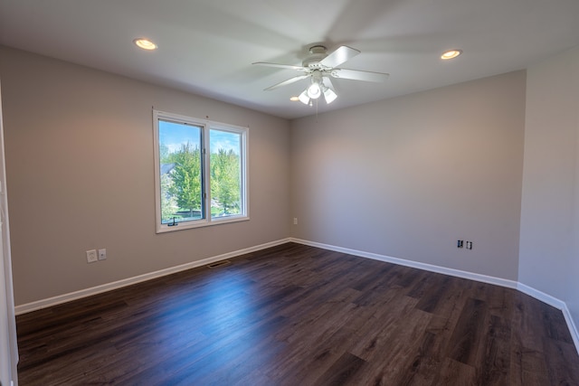 52201 Boland Rd, Chesterfield, MI 48047 - spare room with a ceiling fan, dark wood finished floors, baseboards, and recessed lighting