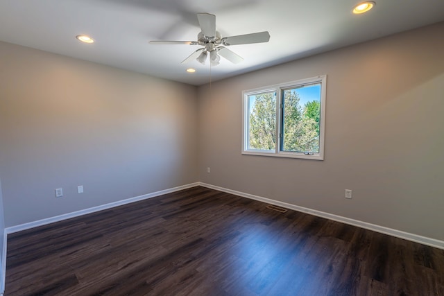 52201 Boland Rd, Chesterfield, MI 48047 - empty room featuring baseboards, a ceiling fan, dark wood finished floors, and recessed lighting