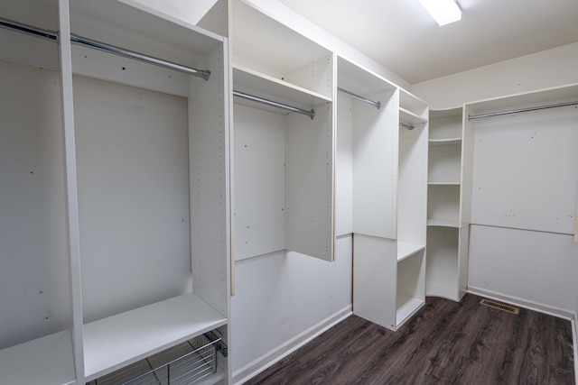 52201 Boland Rd, Chesterfield, MI 48047 - walk in closet featuring dark wood-style flooring