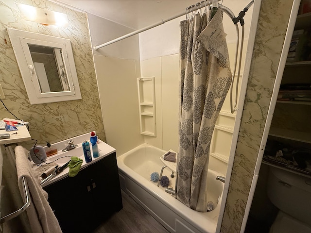 1917 16th St, Port Huron, MI 48060 - full bath featuring shower / tub combo, wood finished floors, and vanity