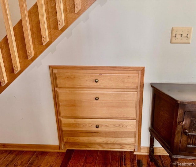 5793 Gark Rd, Attica, MI 48412 - detailed view of wood finished floors and baseboards