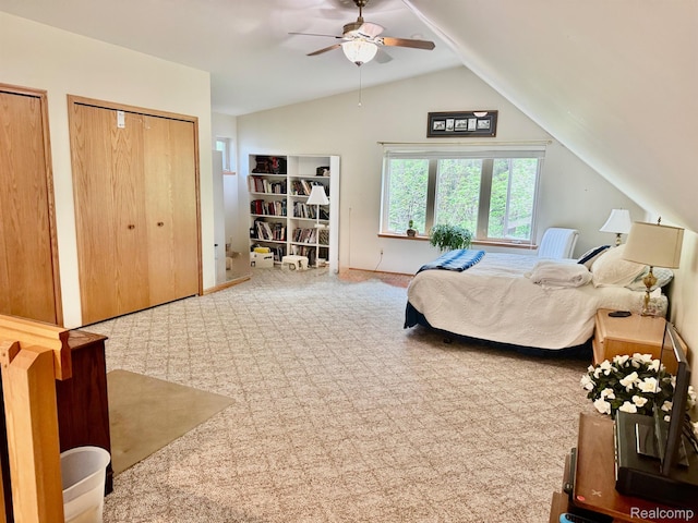 5793 Gark Rd, Attica, MI 48412 - carpeted bedroom with vaulted ceiling, two closets, baseboards, and a ceiling fan