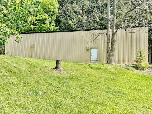 5793 Gark Rd, Attica, MI 48412 - view of green lawn with an outbuilding