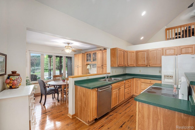 5793 Gark Rd, Attica, MI 48412 - kitchen featuring stainless steel dishwasher, white fridge with ice dispenser, a sink, light wood-type flooring, and lofted ceiling