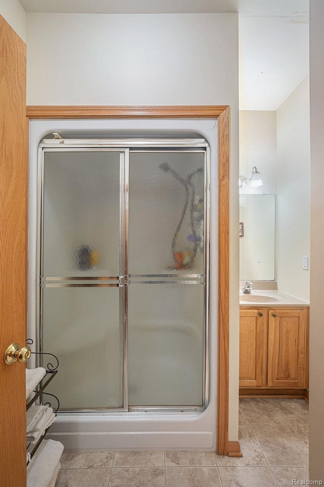 5793 Gark Rd, Attica, MI 48412 - full bath featuring vanity, a stall shower, and tile patterned flooring
