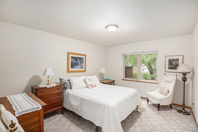 5793 Gark Rd, Attica, MI 48412 - bedroom featuring light carpet and baseboards