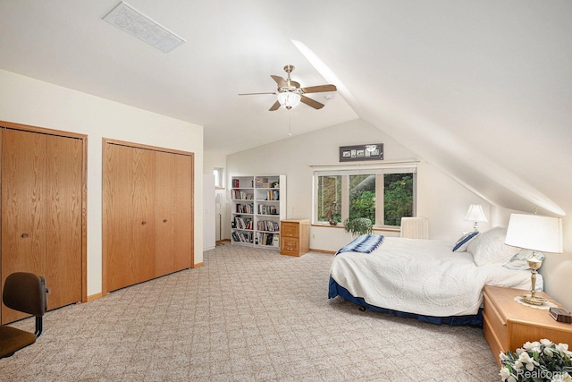 5793 Gark Rd, Attica, MI 48412 - carpeted bedroom with lofted ceiling, two closets, baseboards, and ceiling fan