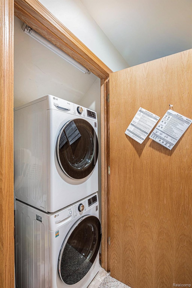 5793 Gark Rd, Attica, MI 48412 - washroom with stacked washer and clothes dryer