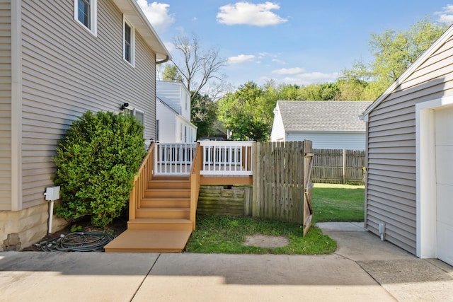 gate with a wooden deck and fence
