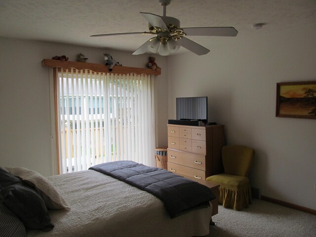 2625 Rolling Ridge Ln NW, Grand Rapids, MI 49534 - bedroom with carpet floors, a ceiling fan, access to outside, and baseboards