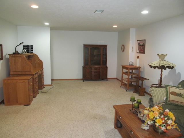 2625 Rolling Ridge Ln NW, Grand Rapids, MI 49534 - living room featuring recessed lighting, light colored carpet, and baseboards