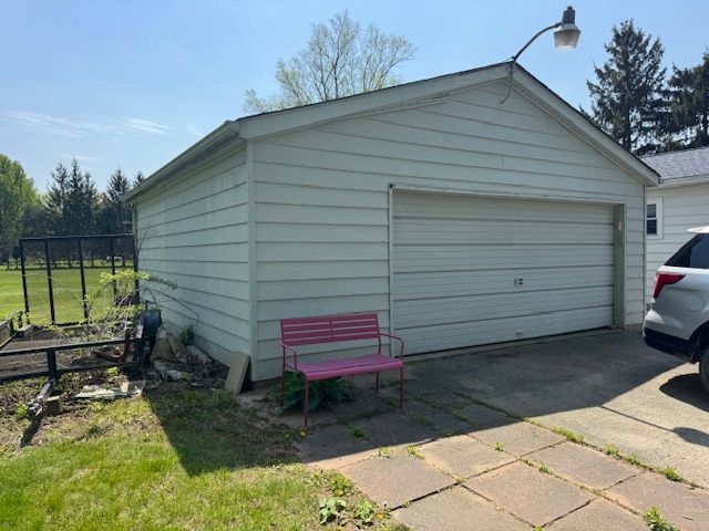 detached garage with fence
