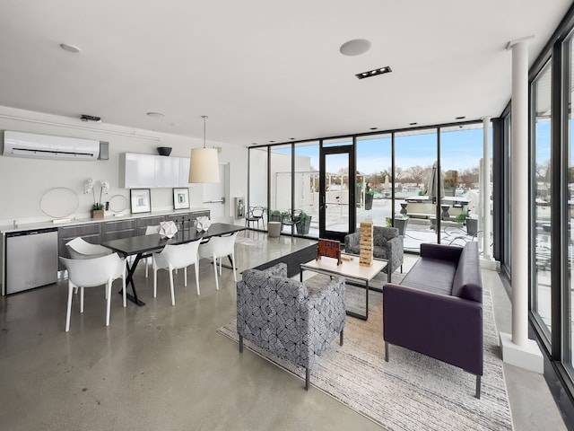 533 E Harrison Ave Unit 18, Royal Oak, MI 48067 - living room featuring a wall mounted AC, plenty of natural light, expansive windows, and french doors
